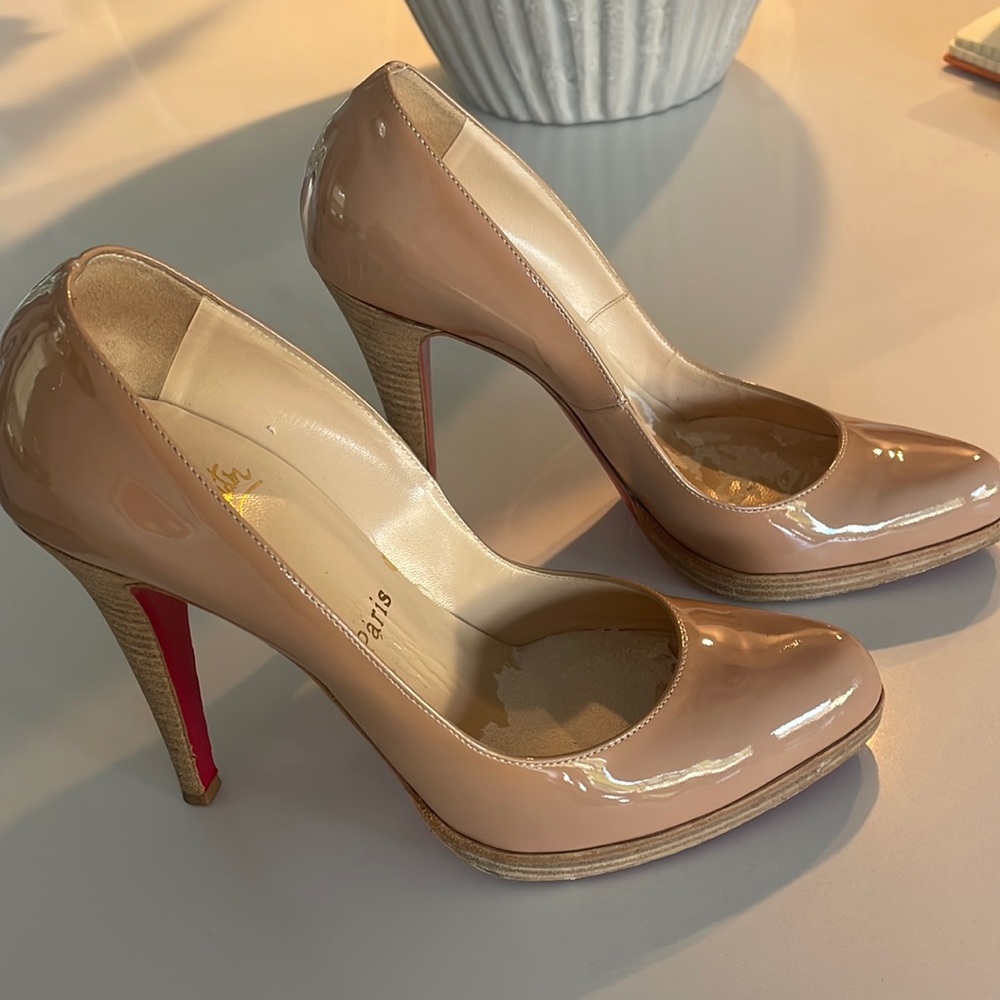 Christian Loubutin beige patent pumps